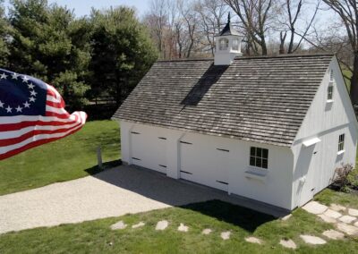 White barn with an American flag
