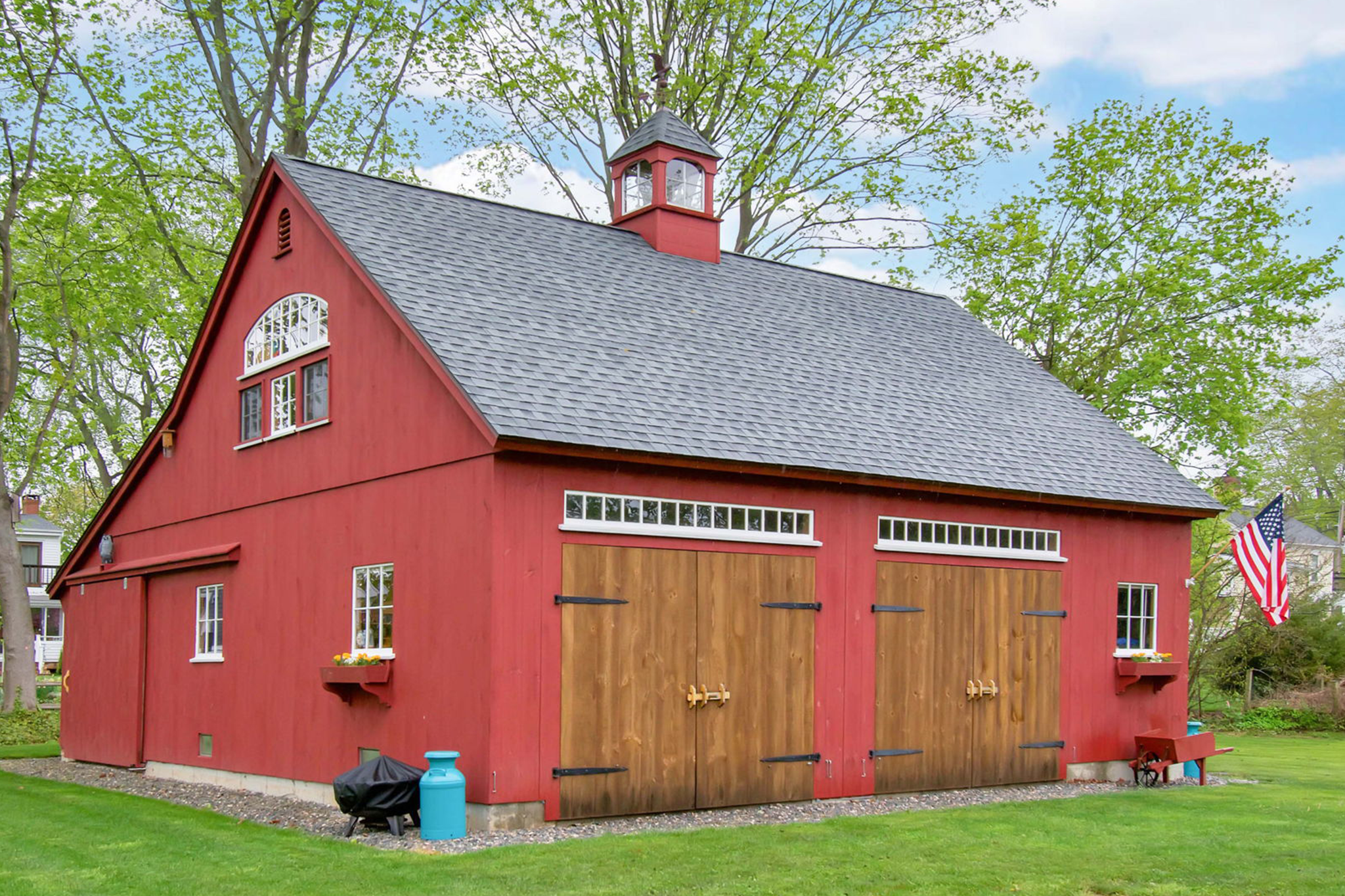 Red Hemingway Post and Beam Barn by Country Carpenters.