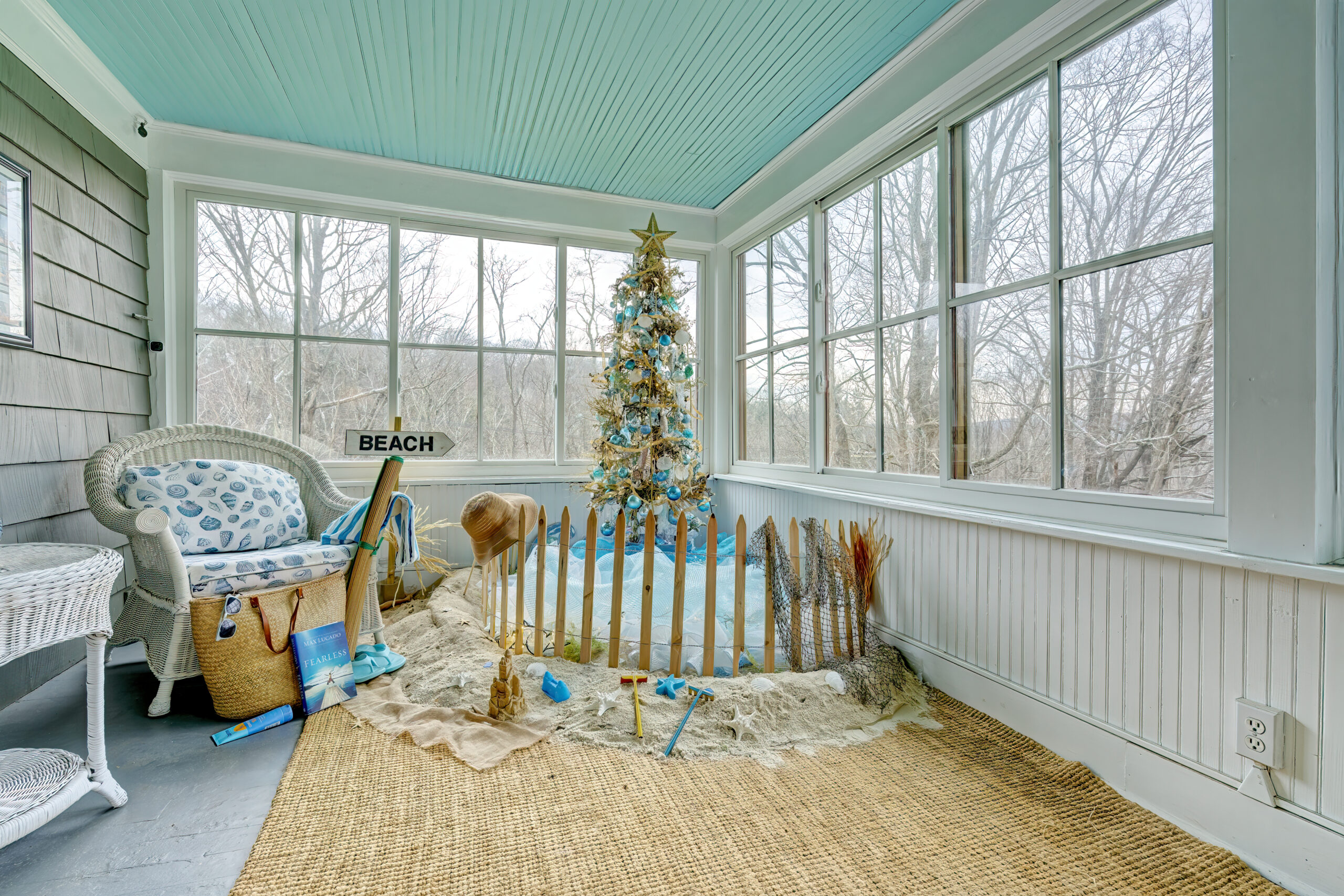 A beach-themed Christmas tree complete with real sand.